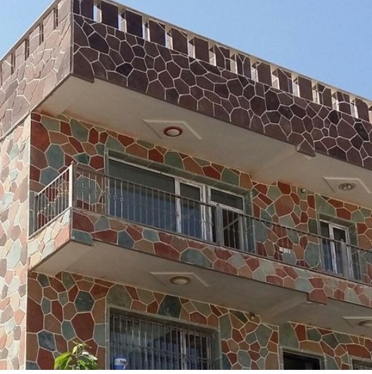 نمای ساختمان سنگ لاشه